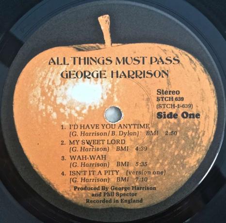 „All Things Must Pass” de George Harrison pe o etichetă portocalie Apple