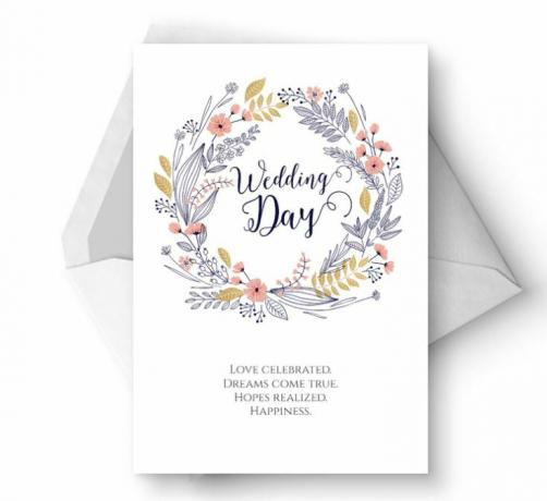 Una tarjeta de boda floral